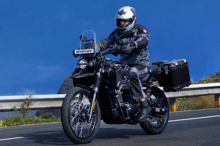 The changes between each variant is purely cosmetic; there are no mechanical or feature differences between variants. 2025 Yezdi Adventure with panniers rolling shot